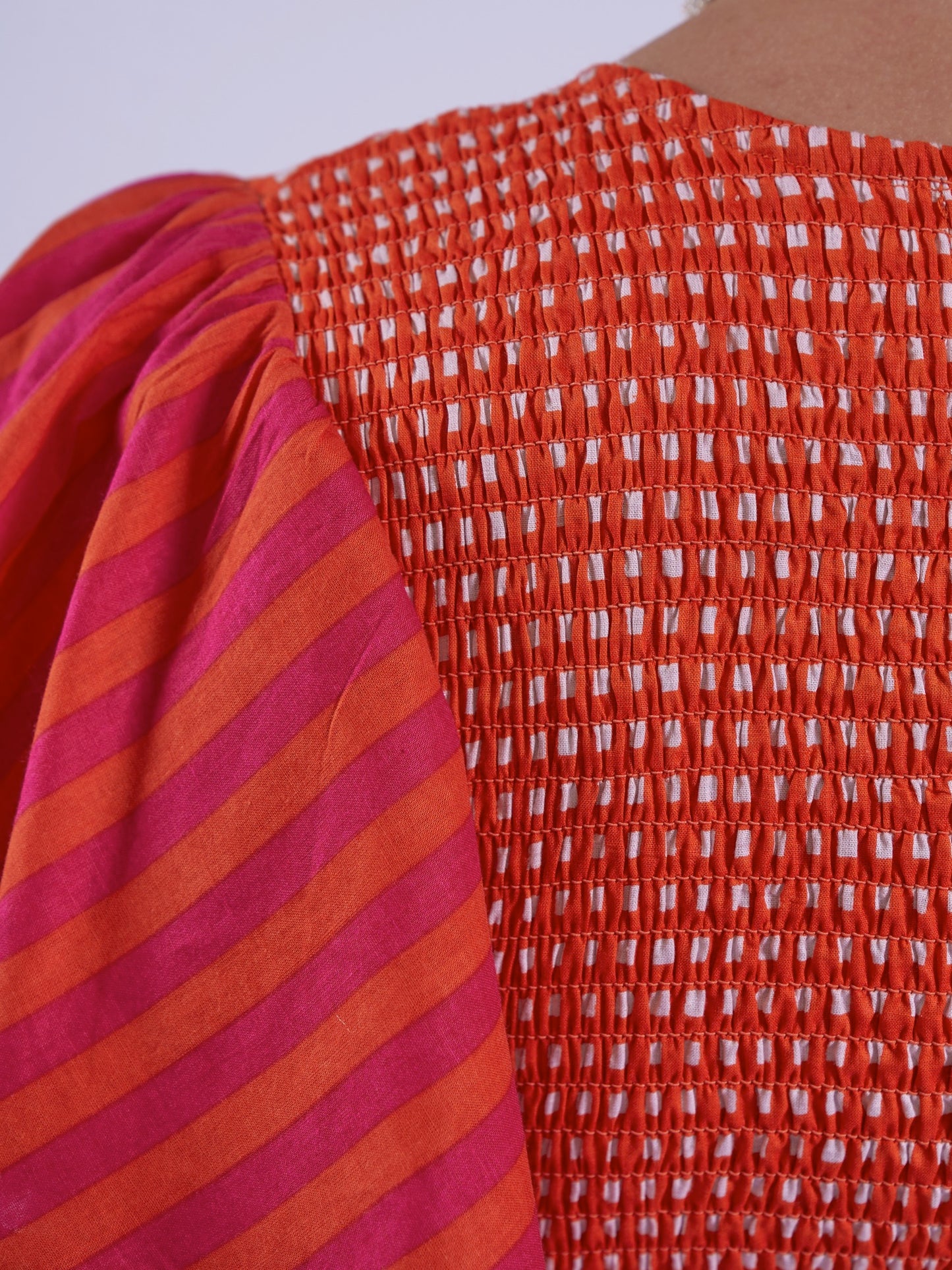 'FEATHER' DRESS IN ORANGE/ PINK STRIPE